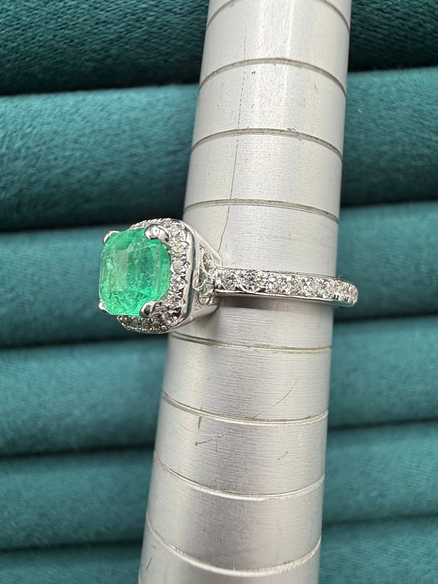 18ct gold emerald and diamond halo ring