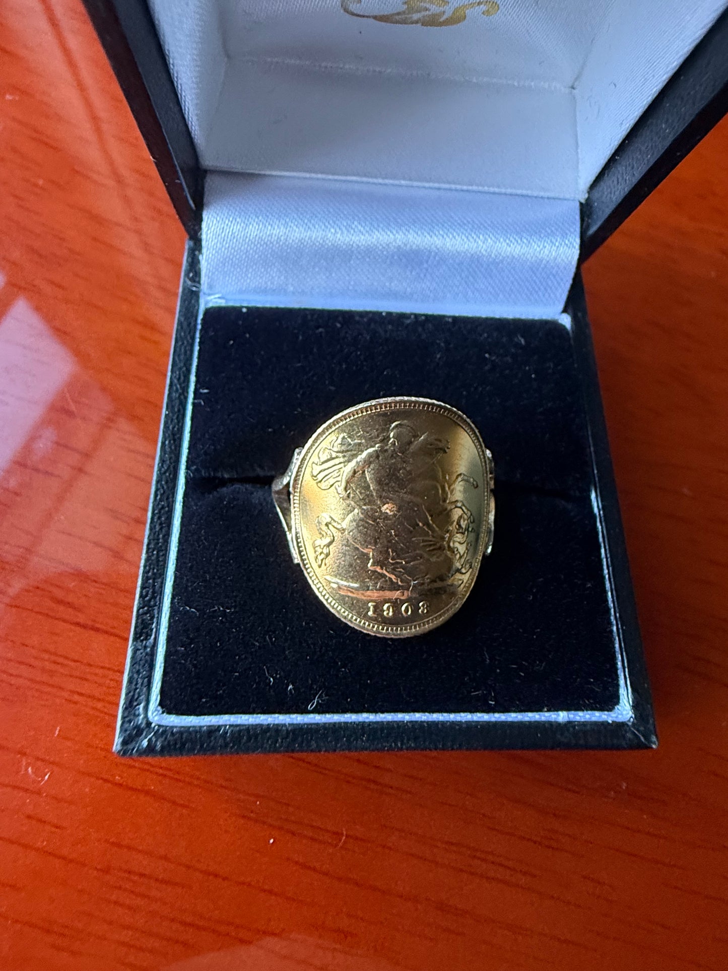Half sovereign ring