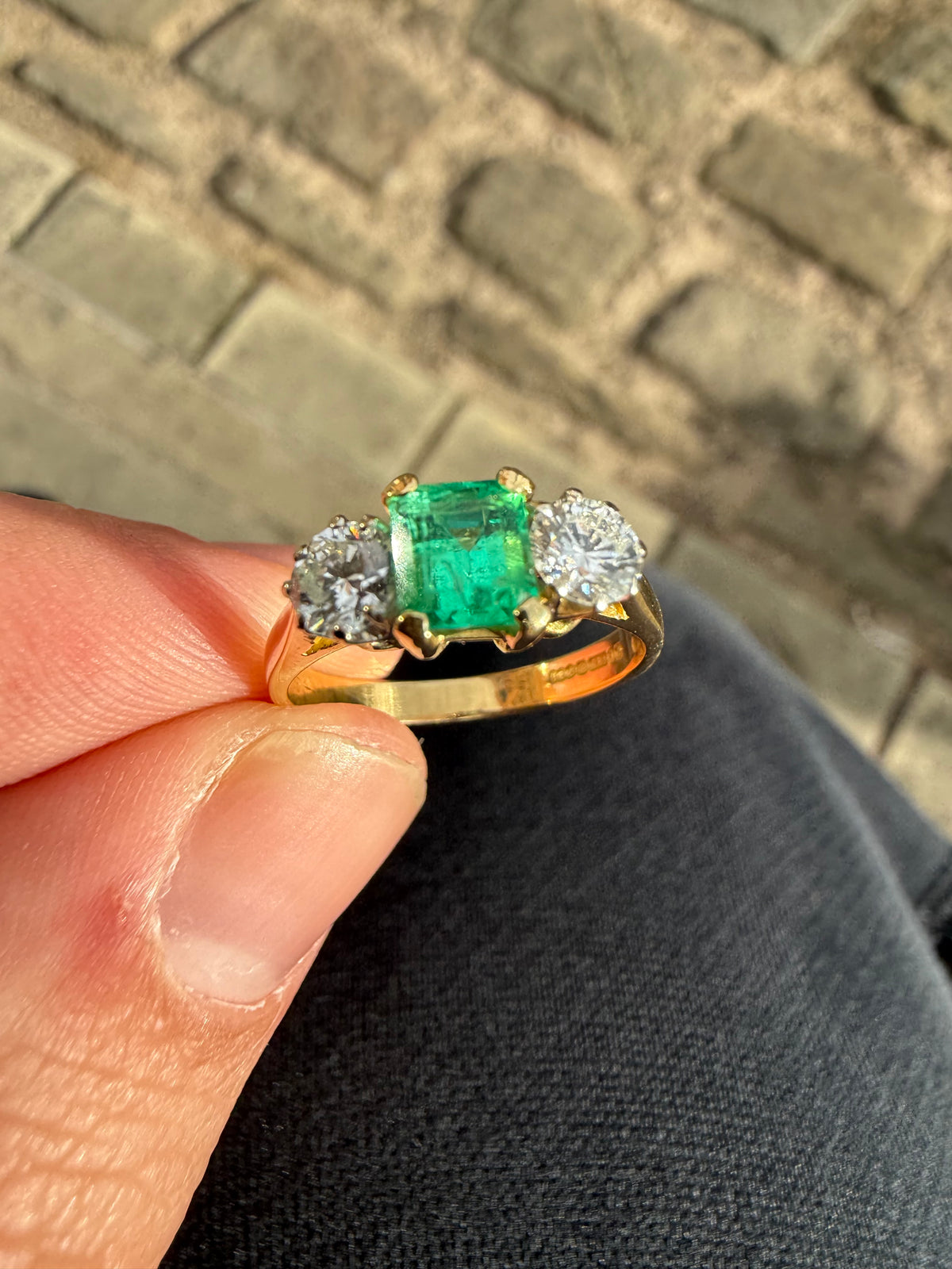 18ct gold emerald and diamond three stone ring