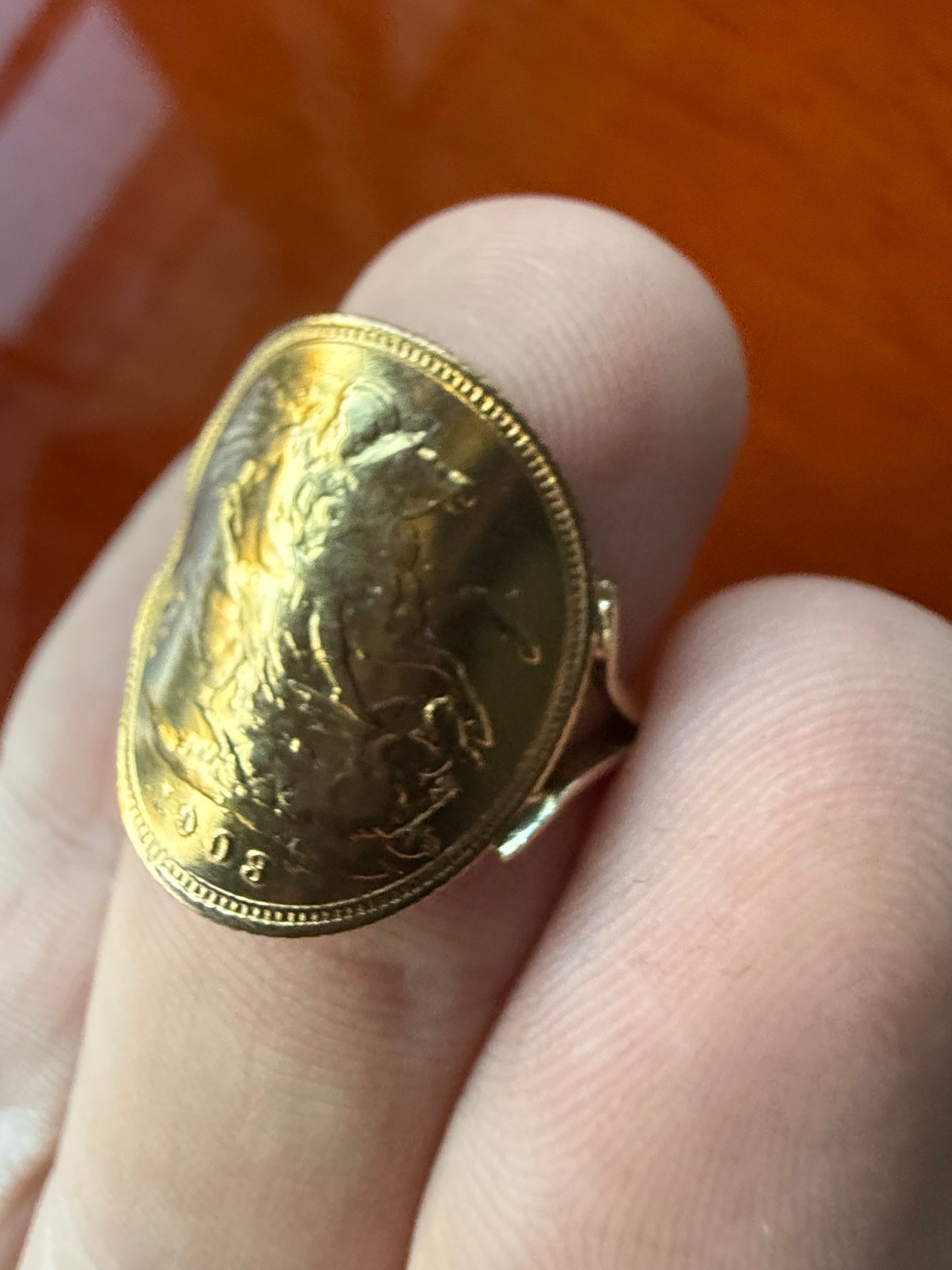 Half sovereign ring