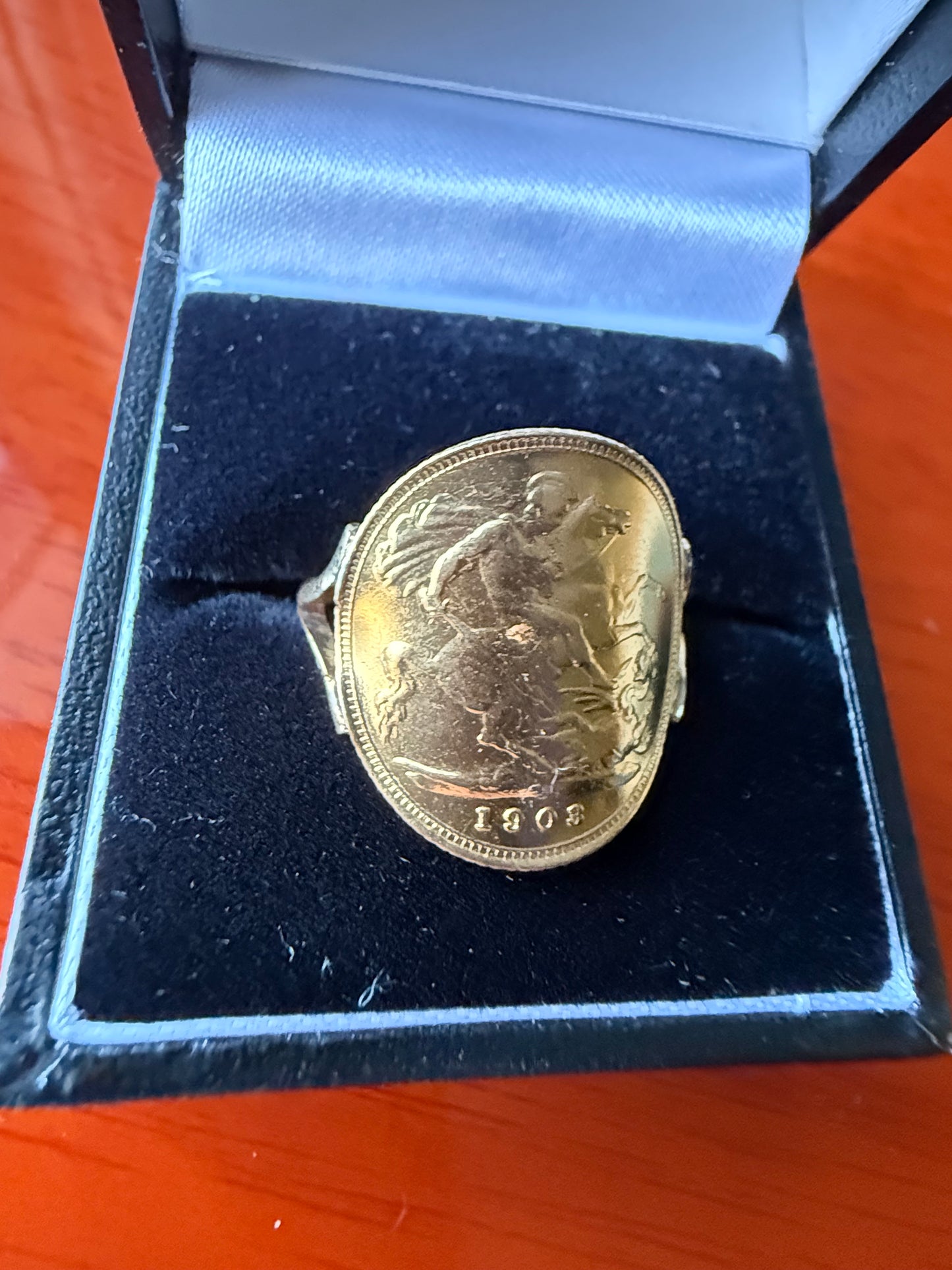 Half sovereign ring