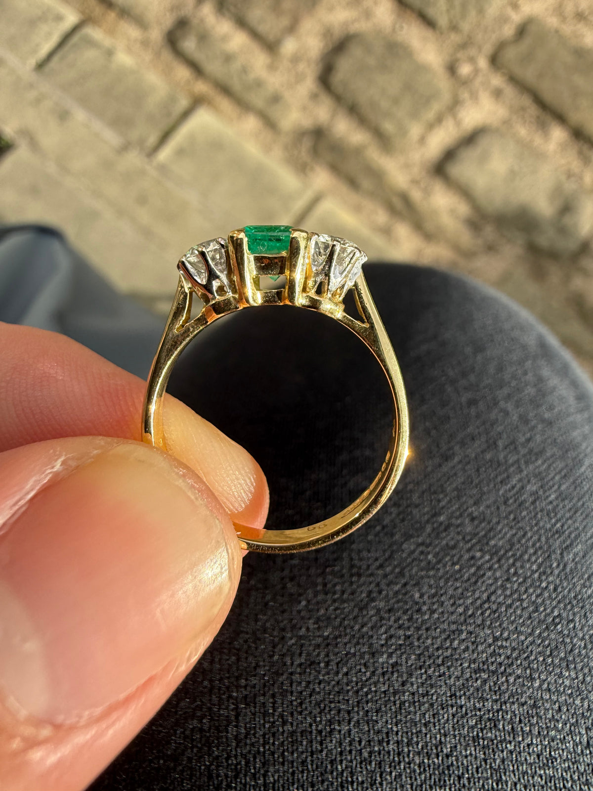 18ct gold emerald and diamond three stone ring