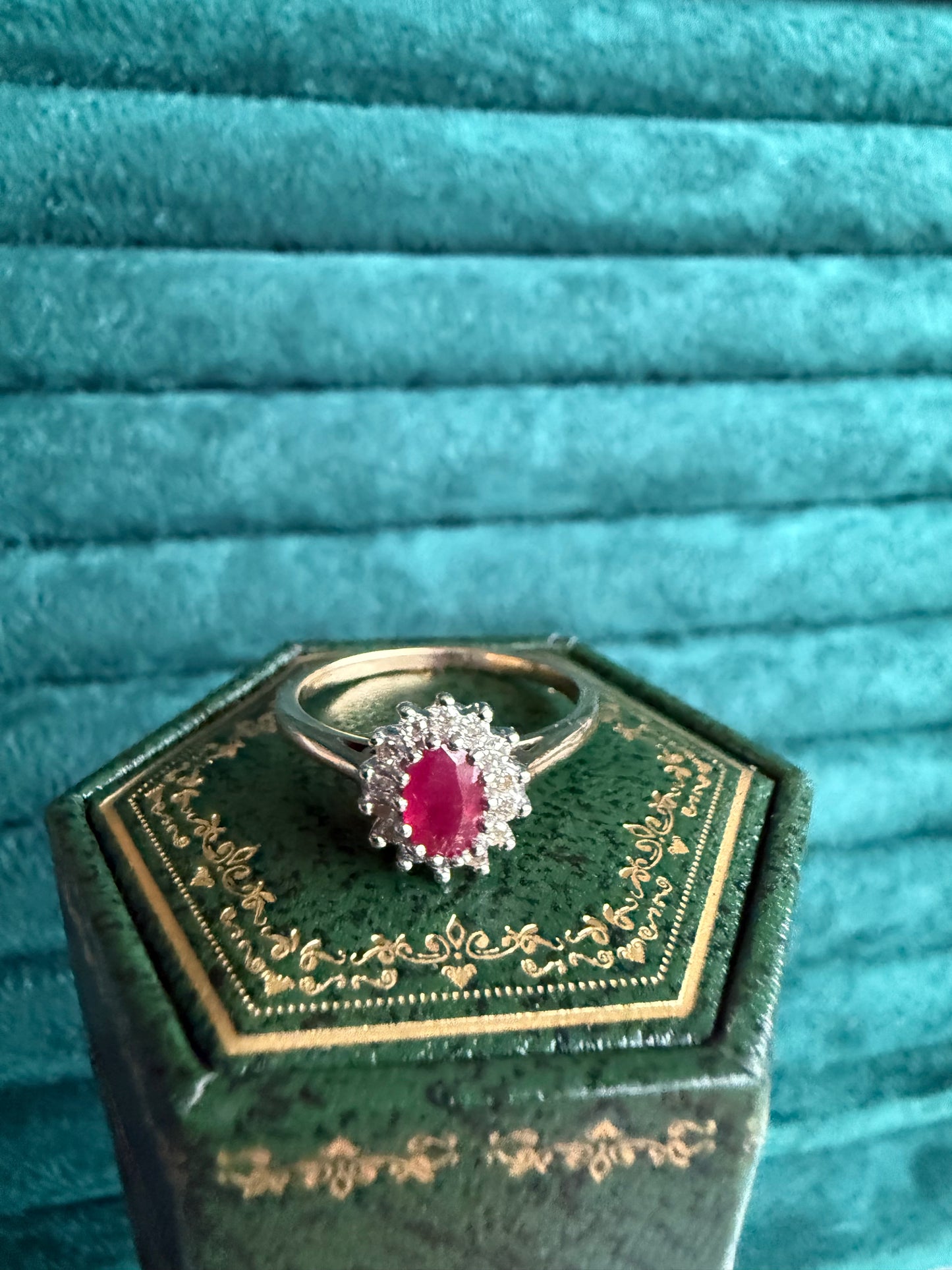 9ct gold ruby and diamond halo ring