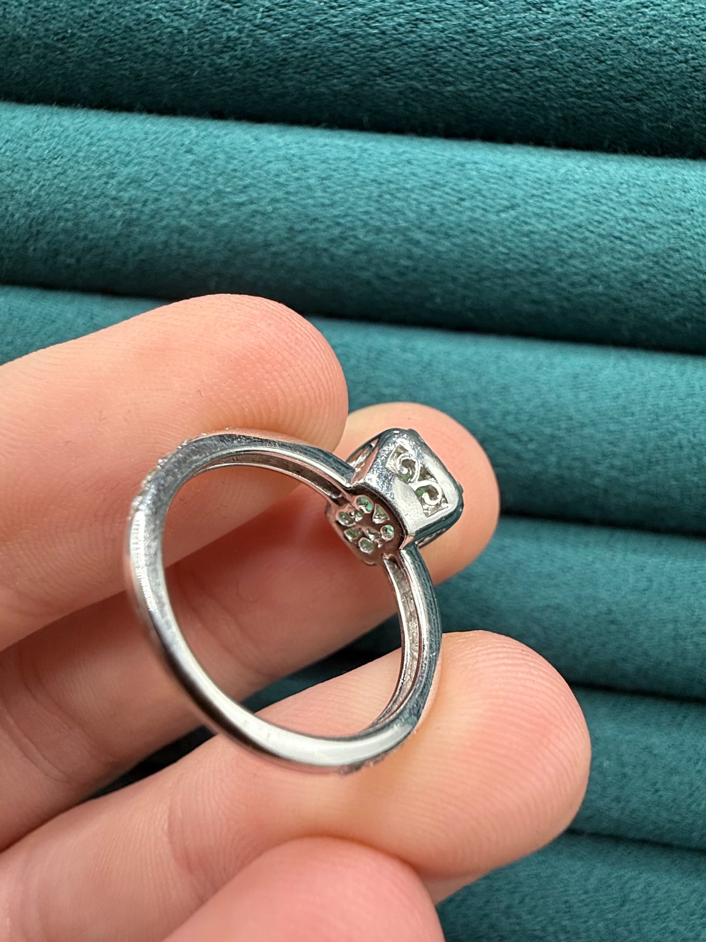 18ct gold emerald and diamond halo ring