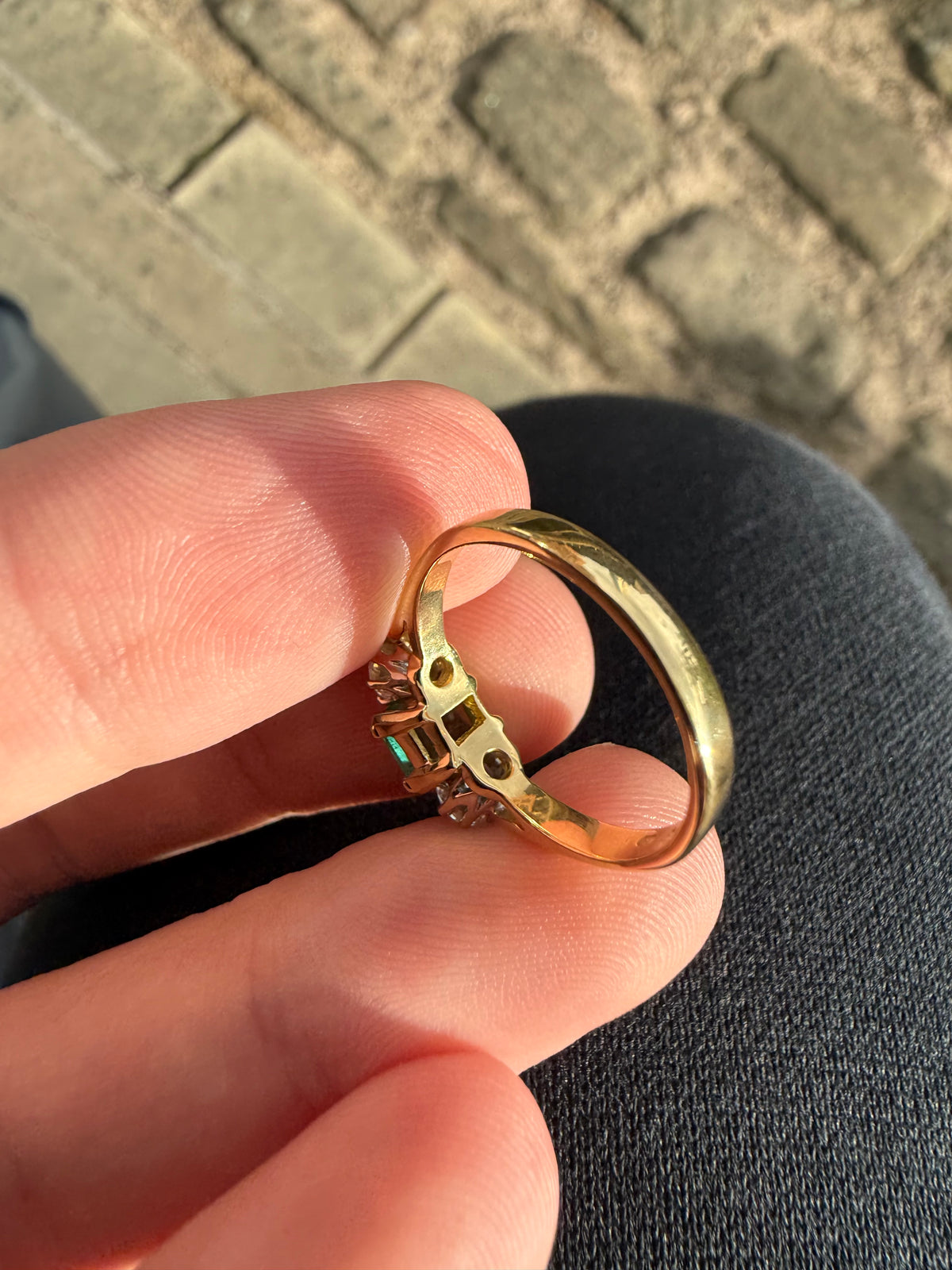 18ct gold emerald and diamond three stone ring