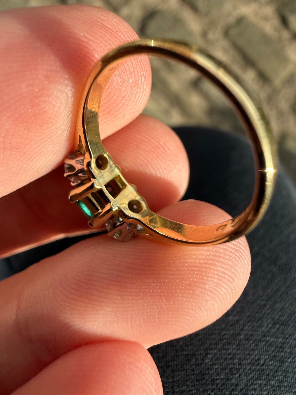 18ct gold emerald and diamond three stone ring