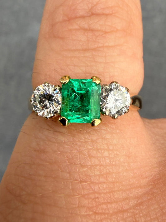 18ct gold emerald and diamond three stone ring