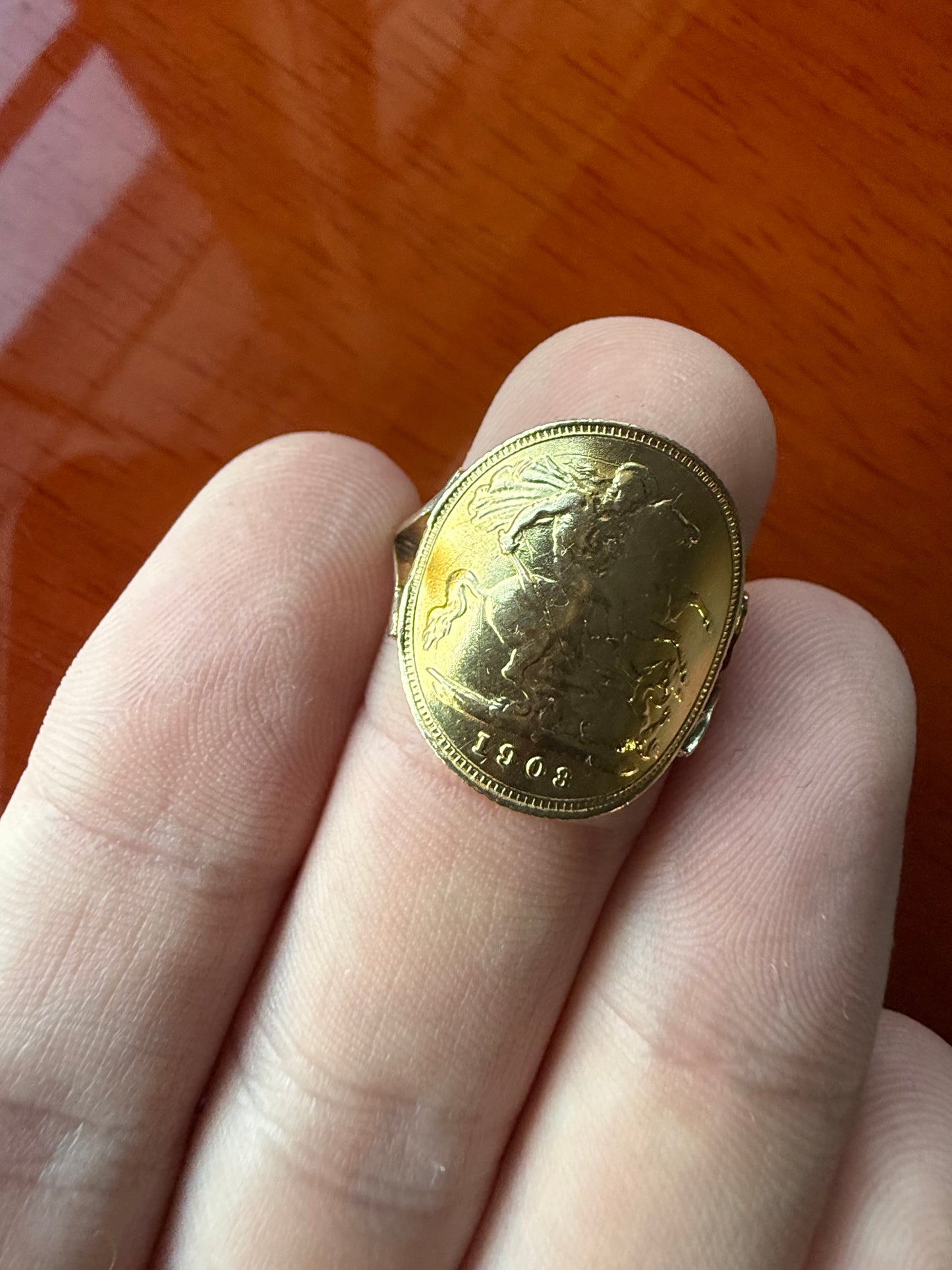 Half sovereign ring