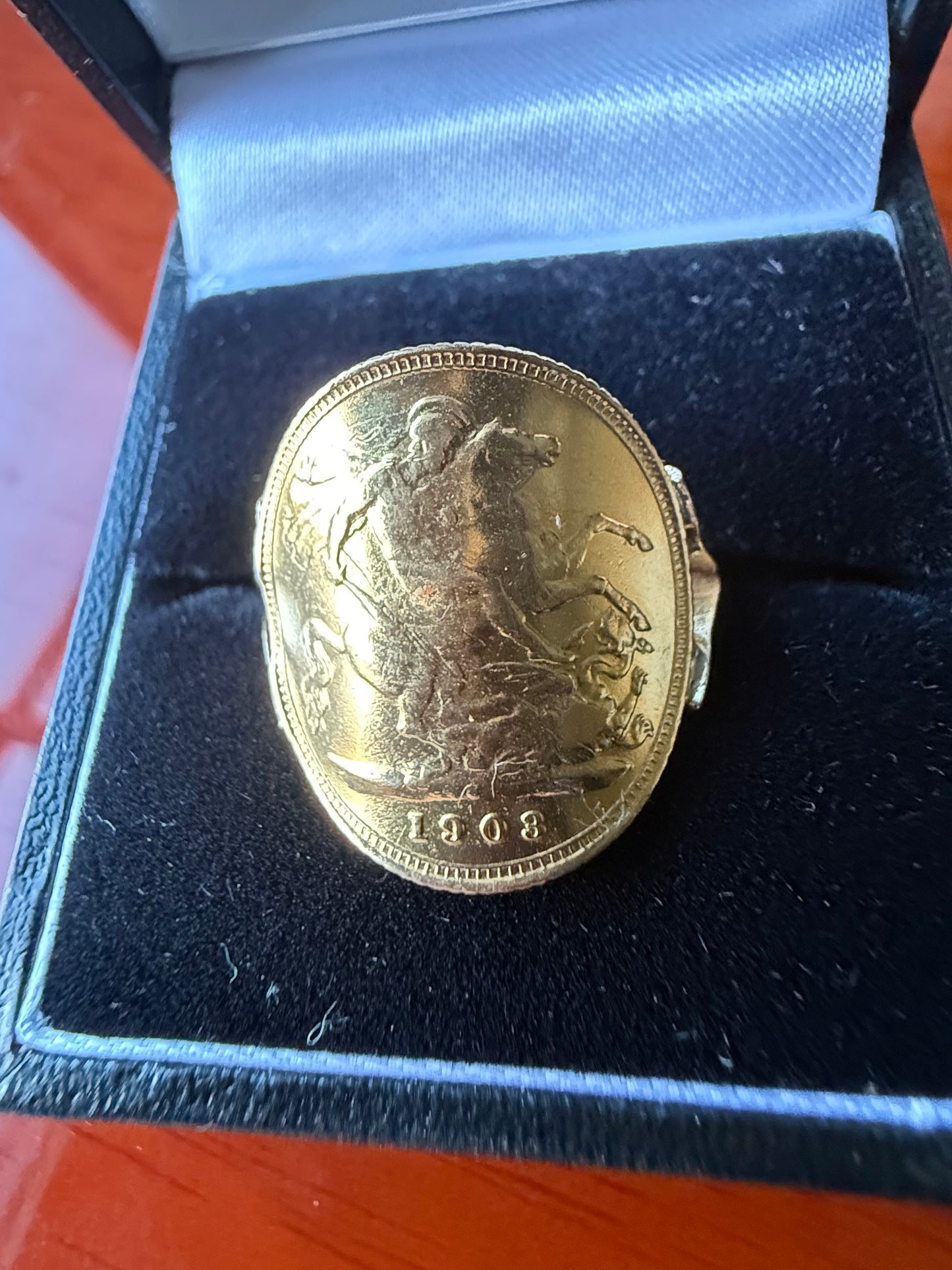 Half sovereign ring