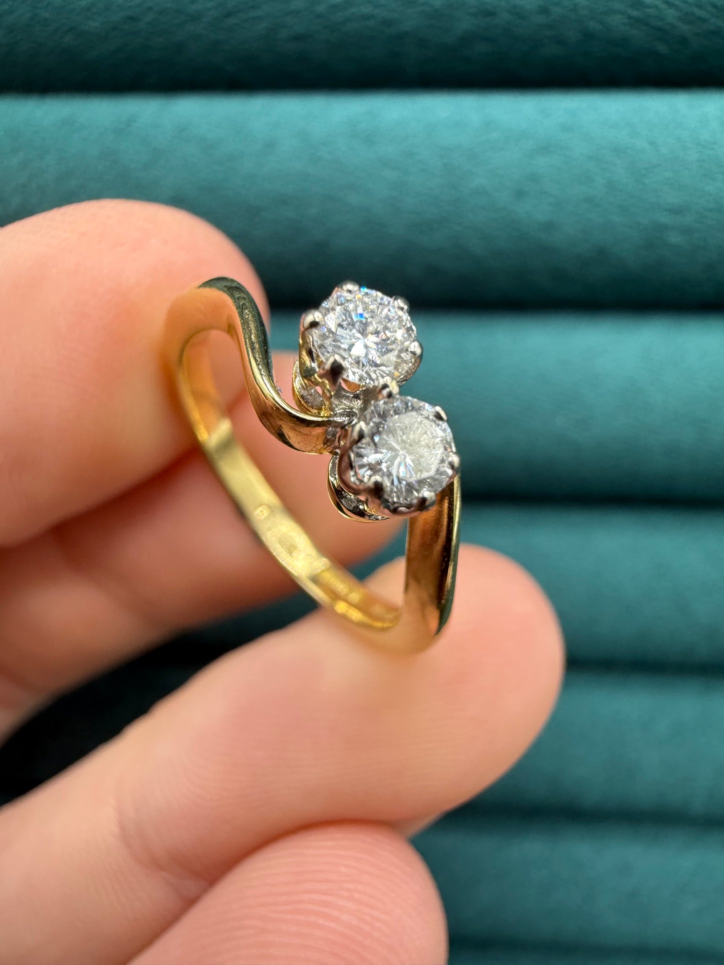 18ct gold diamond twist ring