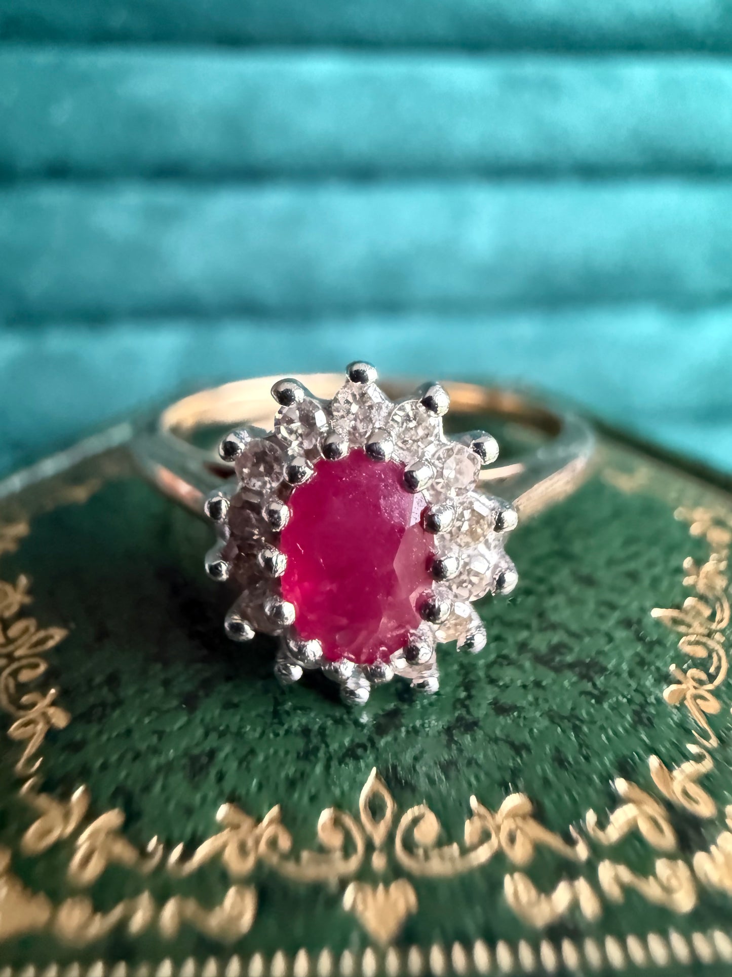 9ct gold ruby and diamond halo ring