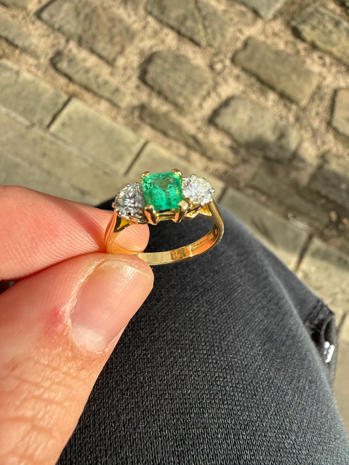 18ct gold emerald and diamond three stone ring