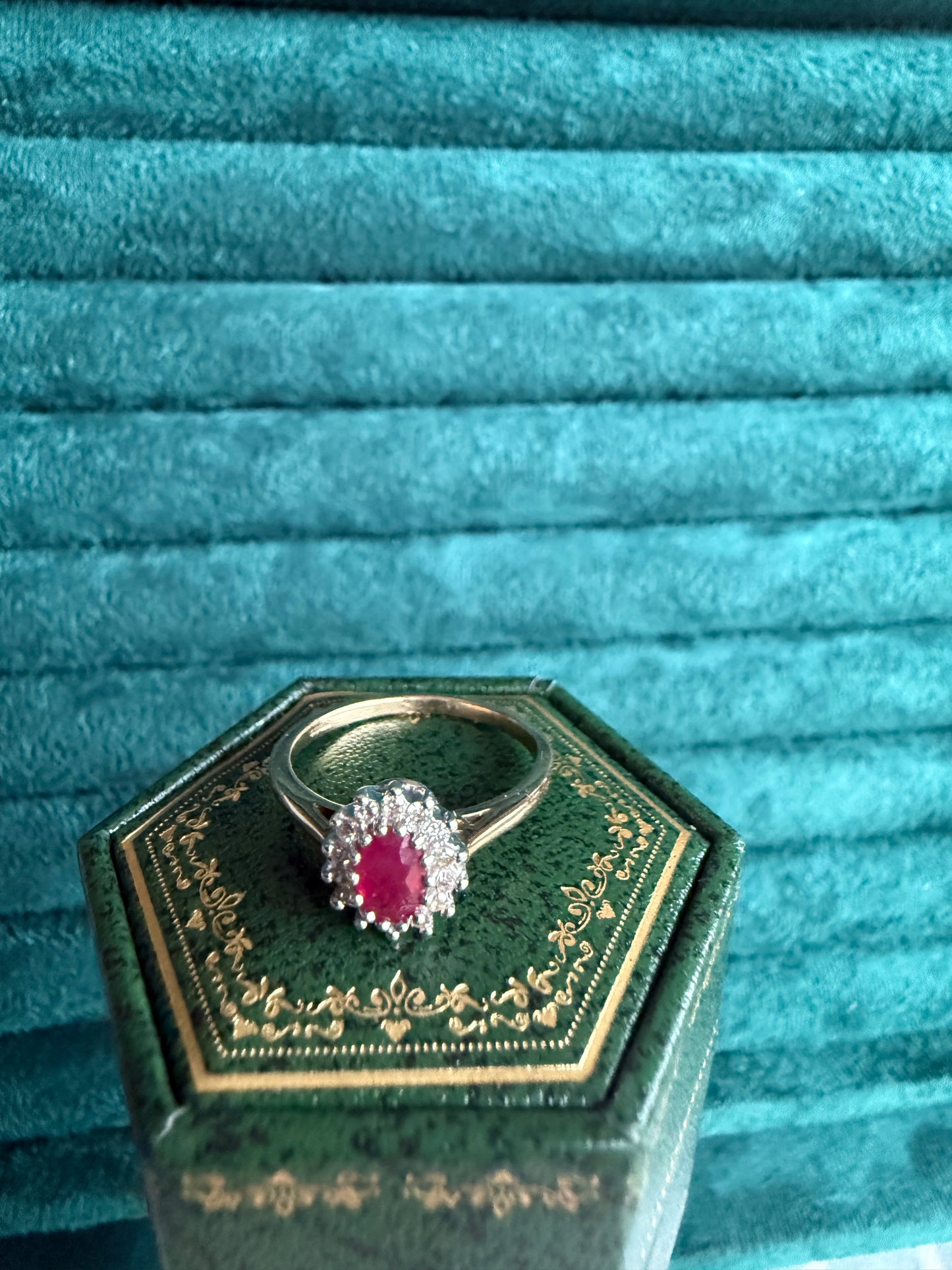 9ct gold ruby and diamond halo ring